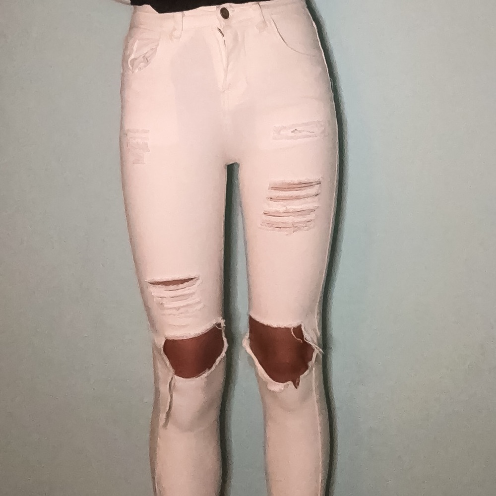 White highwaisted distressed skinny jeans